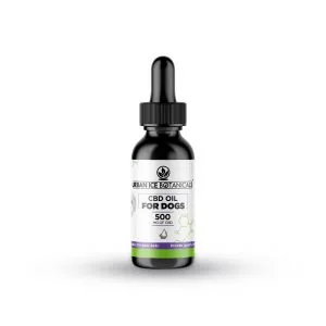 Dropper bottle labeled for dog CBD oil on white background.